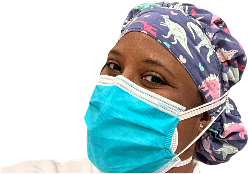 Dr. Ayanna wearing a mask and scrubs