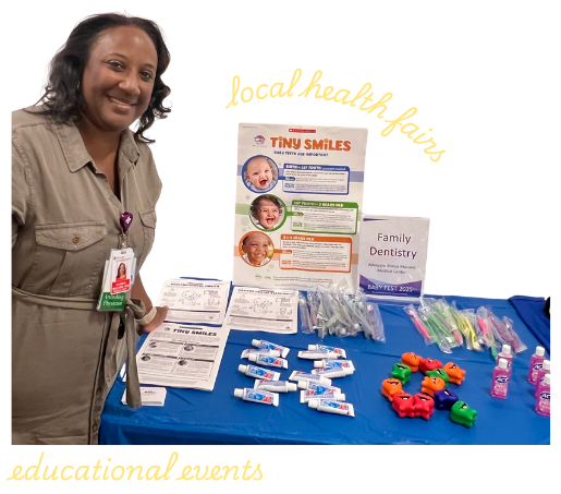Dr. Ayanna smiling at an outreach booth for educational events and local health fairs