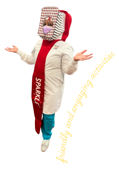 Dr. Ayanna in a toothbrush costume supporting friendly and engaging activities